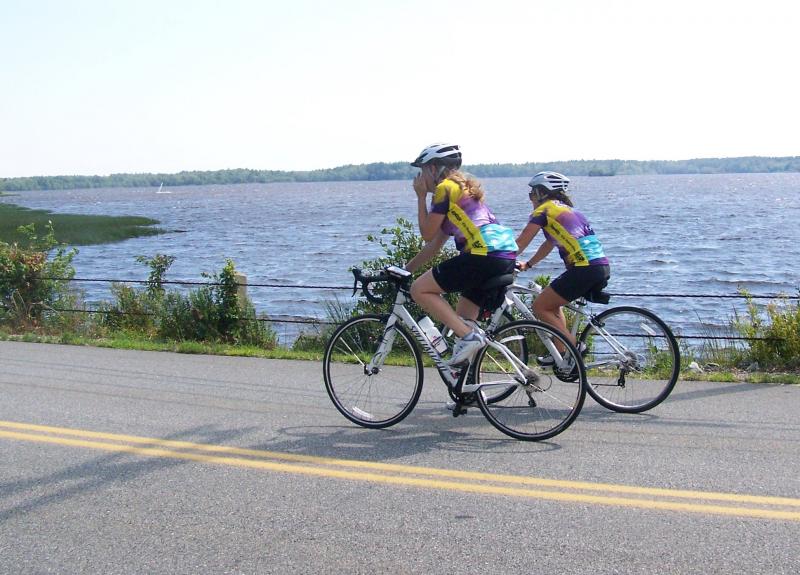 Pan-Mass Challenge riders cross Snipatuit Pond in Rochester on Saturday headed towards Bourne. BY MATTHEW BERNAT